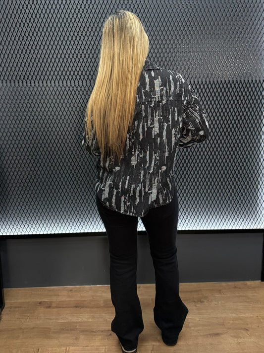 Sobrecamisa Roturas